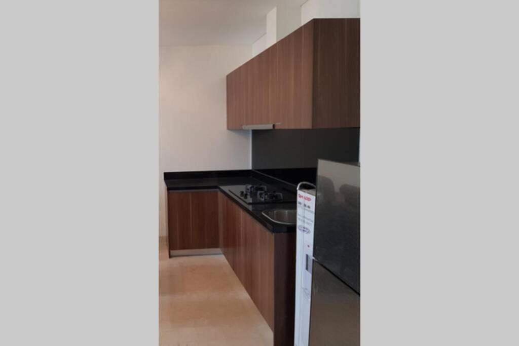 Apartemen Simple And Luxury One Bedroom Lavenue By Sang Living